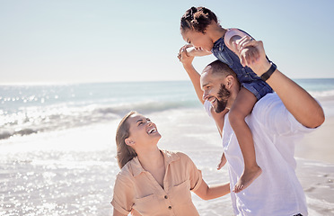 Image showing Beach holiday, mother and father with girl bonding in fun game by Costa Rican ocean or sea for summer. Smile, happy and playful man, woman or parents carrying family daughter, kid or child in nature