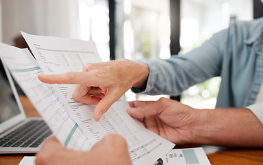 Image showing Finance, budget and retirement people planning paperwork, savings or bills for wealth, investment and pension income. Senior couple hands reading financial document, tax management or life insurance