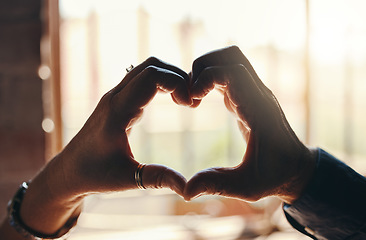 Image showing Heart, hands and gesture for love, care and relationship in trust, unity and commitment. Closeup hand of couple together in romance shape for bonding sign or symbol against blurred background