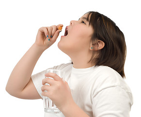 Image showing Child Taking Vitamin C