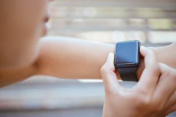 Image showing Fitness, woman and hands for time on watch checking or monitoring health after exercise training workout outdoor. Hand of female with smartwatch monitor check and time in healthy run or cardio sports