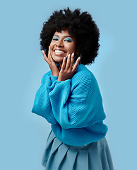 Image showing African beauty, makeup and portrait of a black woman with blue eyes shadow, face cosmetics and afro hair or good skin. Funk, smile and young happy girl with vintage, retro and creative fashion style.