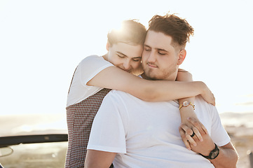 Image showing Love, hug and relax couple on car for peace, freedom and sun on romantic road trip date for quality bonding time. Holiday, travel or calm young man and woman together with transport and sun flare