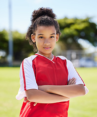 Image showing Black young girl, portrait on soccer field outdoor stadium and confident fitness in Brazil sports training game. Fitness motivation for female athlete, proud african child win and football uniform