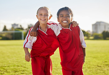 Image showing Portrait, girl friends and smile on football field training for match, game or competition. Soccer, sports and kids on grass pitch learning ball sport for wellness, health and fitness exercise.