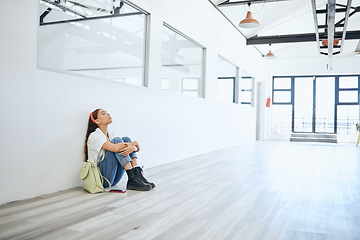 Image showing Stress, burnout and mental health with a woman student thinking about exam, education finance and life stress. Young female frustrated with university, college or school debt in a campus hall or room