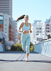 Image showing Fitness, sport or woman running on bridge in city, town or street for wellness, exercise or marathon training. Girl, athlete or runner from Canada with health, motivation and sports workout