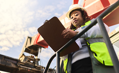 Image showing Documents, shipping and supply chain with a logistics black woman working in export and import industry from below. Distribution, freight and cargo with a female courier reading an order form outside