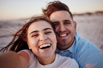 Image showing Couple, smile and beach together for selfie with happiness on face on holiday, honeymoon or vacation. Man, girl and happy at ocean on travel in summer in romantic photo for love, bonding and care