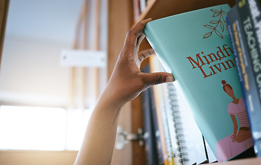 Image showing Books, research and hands of woman in library of university for education, learning and knowledge. Vision, student and goals with girl choosing from bookshelf for reading, college and information