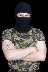 Image showing The man in a black mask over black