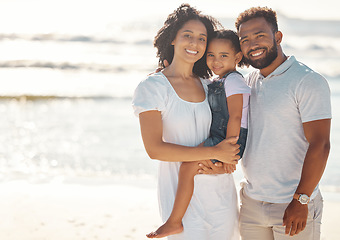 Image showing A mock up black family on holiday, happy at beach and smile in summer sun. Mother with her man, girl child on seaside vacation and stand in waves by ocean. Parents with kid relax, destress and unwind
