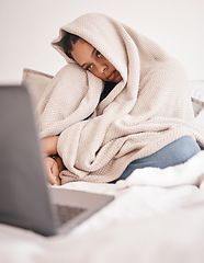 Image showing Laptop, mental health problem and insomnia woman from Rome feeling sad on a bed with depression. Depressed person with a computer in a house bedroom blanket with stress, sick or with anxiety at home