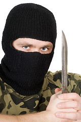 Image showing Portrait of the criminal with a knife over white