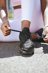 Image showing Start, runner woman and shoes tie preparation for cardio workout and active lifestyle closeup. Fitness girl getting ready with athlete training footwear lace for outdoor running exercise.