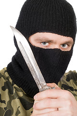 Image showing Portrait of the criminal in a black mask with a knife 