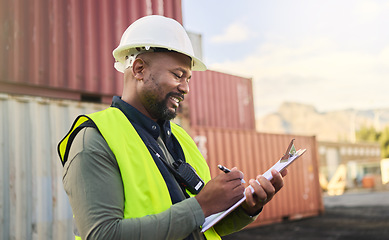 Image showing Logistics, inspection, shipping and black man writing notes working at storage container port. African industrial manager happy with documents for cargo at an outdoor manufacturing warehouse