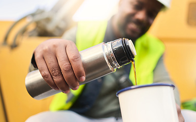 Image showing Black man and construction worker on lunch for coffee or tea in cup on site, doing cargo and shipping. Male contractor, smile and guy use mug for hot beverage in flask and helmet for logistics work.