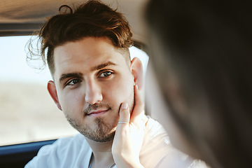 Image showing Face, love and romance with the hand of a woman on the cheek of her boyfriend in a car on a road trip for dating and travel. Couple, transport and date with a man and girlfriend in a vehicle