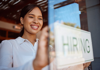 Image showing Hiring, recruitment and coffee shop with a woman small business owner hanging a sign in her window. Cafe, startup and management with a female entrepreneur ready to interview staff for a job opening