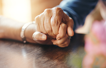 Image showing Senior couple holding hands, love and support for trust, retirement and care together. Closeup old man, elderly woman and hope for helping touch, empathy and solidarity, kindness and happy marriage