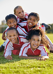 Image showing Team, children and happy on field in sports after win in match, game or competition. Girl, smile and together after teamwork in soccer, football or sport on grass for motivation, diversity and unity