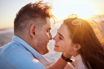 Image showing Beach, smile and face of couple with embrace on holiday by the sea and nature travel in Greece in summer. Happy and love man and woman at the ocean during sunset with affection on vacation together