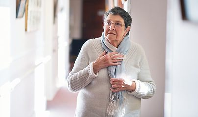 Image showing Retirement, wow and lifestyle with a senior woman with gray hair looking shocked or surprised in her home. Shock, surprise and awe with an elderly female pensioner in her house alone during the day