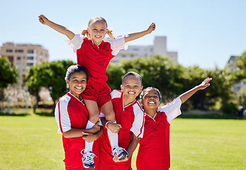 Image showing Children, sport and winner by girl soccer player on field team sports victory with little champion group. Fitness, training and football practice by friends celebrating success after competitive game