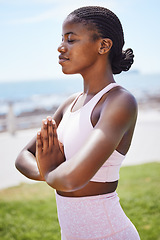 Image showing Nature yoga, meditation and black woman praying for spiritual wellness on the grass in the city of San Francisco. Calm, happy and young African girl doing zen exercise for mind health in a park