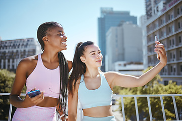 Image showing Fitness selfie, urban city and women friends or influencer for outdoor workout, motivation and training. Personal trainer or runner couple people taking photo together for social media wellness post