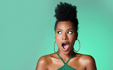 Image showing Surprise, trendy black woman and green studio background portrait with wow secret and style. Fashion and african american female makeup girl with deal, discount and gossip smile with mockup space