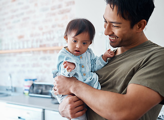 Image showing Down syndrome, baby and father bonding in their home with a proud parent caring for special needs infant in India. Love, family and child with happy man or dad carrying newborn with a disability