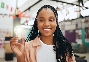 Image showing Light bulb, idea and black woman student portrait in classroom for learning innovation, education and knowledge. Inspiration, ideas and college girl with lightbulb icon or sign for problem solving