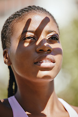 Image showing Shadow, fitness and hand of black woman for safety from sun during cardio training in city of New Zealand. Face of an African runner thinking of motivation for run, exercise and workout with cover