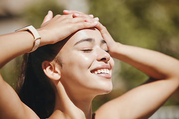 Image showing Face, relax and happy woman in sunshine, outdoor fresh air and peaceful break for mental health, wellness and body. Summer, happiness and smile latino girl relax in nature, park rest and calm freedom