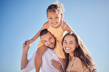 Image showing Happy, love and freedom with family against the blue sky together for relax, support and care. Smile, summer and girl on father shoulders with mother in the outdoor for lifestyle, youth and nature