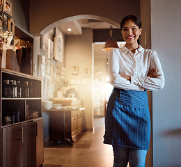 Image showing Woman at hospitality restaurant, waitress with a smile and confidence waiting for customers for dinner or lunch service. Portrait of friendly, professional waiting staff in uniform and in clean apron