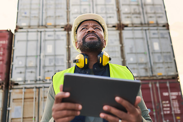 Image showing Logistics, tablet and black man doing container inspection at an industrial cargo, shipping and freight supply chain. Delivery manager or industry worker working at a distribution trade port outdoors