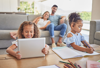 Image showing Home learning sisters, kids writing and girls with tablet watching educational video in living room while mom and dad relax on sofa. Education and children drawing in family home in Brazil