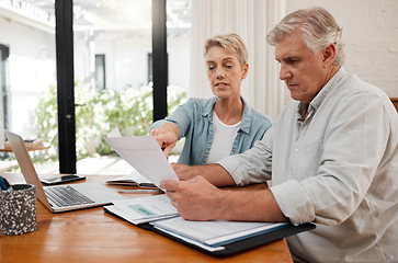 Image showing Retirement couple budget, finance and investment planning, loan and paper bills for online banking at home. Senior man, woman and people reading tax money report, cash savings and admin document note