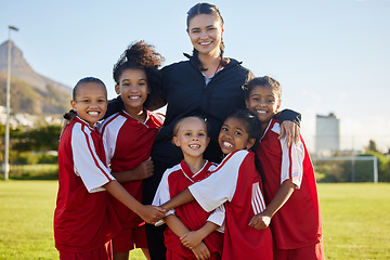 Image showing Football, happy and girl team with coach on a sport soccer field after training or a game. Teamwork and collaboration with a happy group of female athletes play for fun, to win and succeed