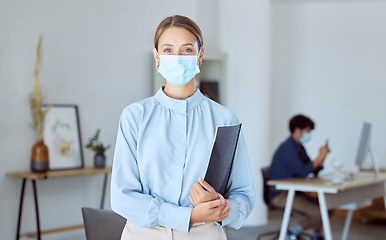 Image showing Covid business woman, portrait and face mask rule for staff safety, healthcare and corona virus risk in startup agency. Female manager, entrepreneur and covid 19 pandemic protection in modern office