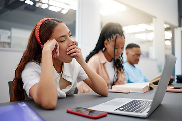 Image showing Burnout, tired and university student study in class lecture or library with laptop learning or digital education scholarship application or research. Fatigue, yawn and gen z woman college technology