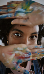 Image showing Hands, eyes and paint with a woman art student closeup with color painting on her palm for artistic expression. Creative, artist and vision with a young female painter in her studio or workshop