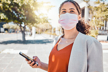 Image showing Covid face mask, phone gps and woman on the internet in a road for location in the urban city of Singapore. Business person doing search on web with technology and covid 19 in the street of town