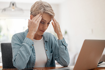 Image showing Stress, headache and a woman with gray hair at laptop in living room. Audit, home finance and debt, overworked and tired senior lady working on tax report or retirement fund paperwork online at home.