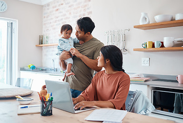 Image showing Family, baby and down syndrome while mother work online with laptop in kitchen. Mom, father and child play while mother use computer for learning, education or college on the internet in house