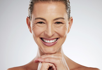 Image showing Skincare, anti aging and beautiful mature woman with a smile on her face on white background. Beauty, botox and collagen, a middle aged lady from USA with health, wellness and wrinkles on clean skin