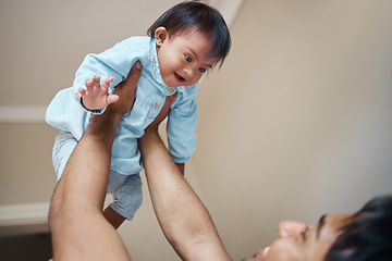 Image showing Down syndrome, baby and father with love for child, smile for care and happiness in their house. Newborn kid with disorder or condition happy, playing and laughing with dad as family in their home